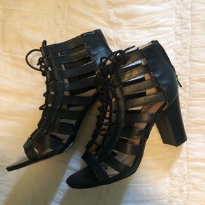 Strapped black heels